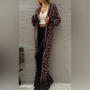 Long rainbow color boho cardigan sweater. Fringed bottom.